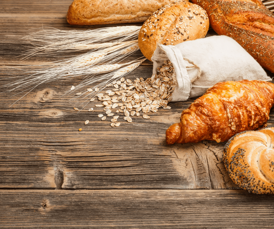 bread, pastries, and a linen bag of oats