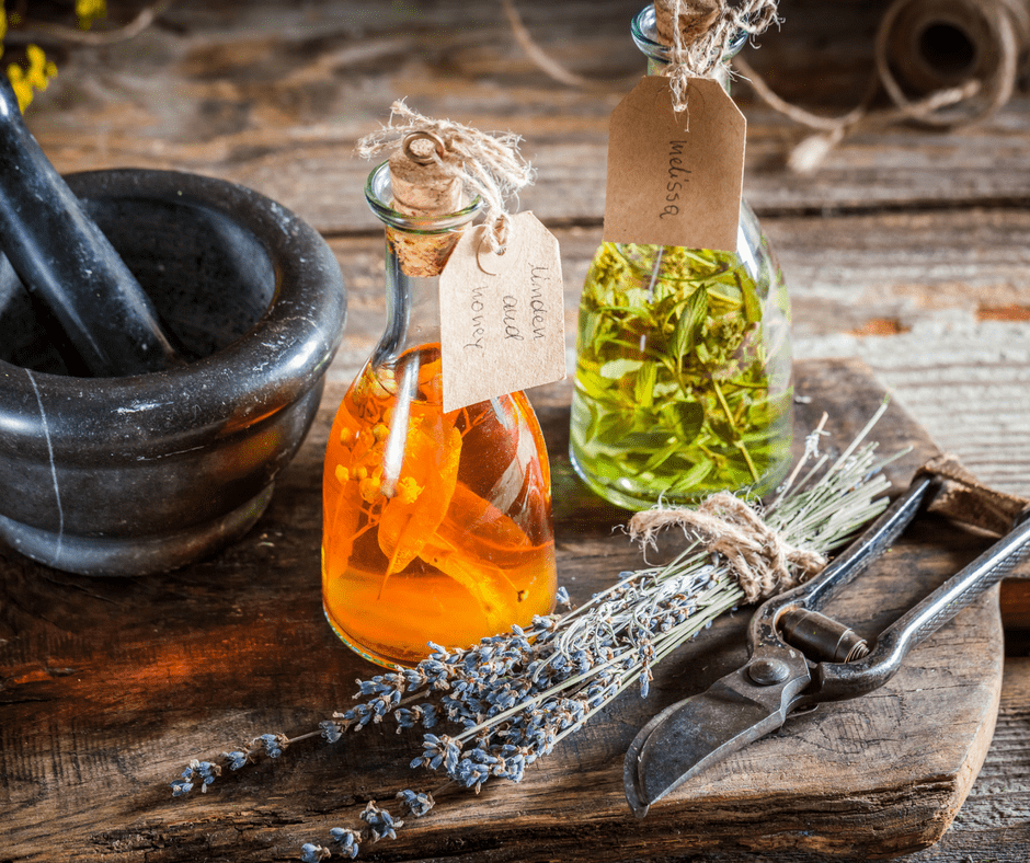 homemade tinctures on a wooden table