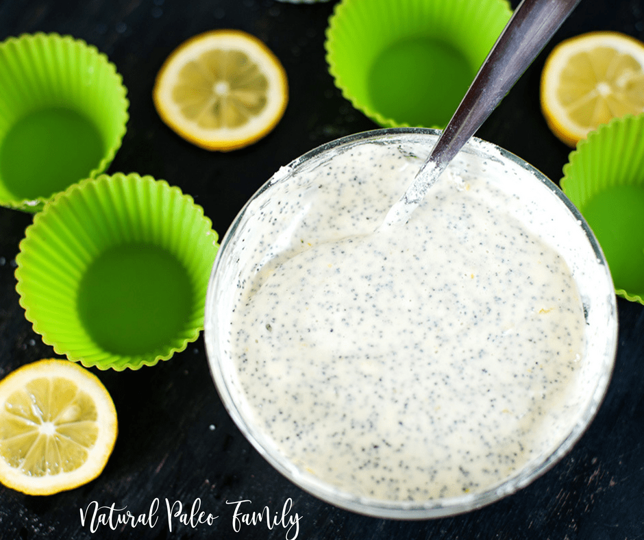 paleo lemon poppyseed muffin batter and green muffin cups